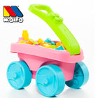 Pink stroller with blocks