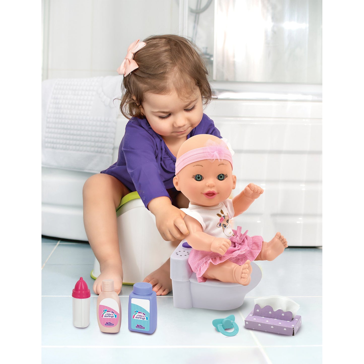 בובת תינוק 25 סמ עם סיר דמוי אסלה