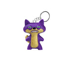 Fugglers holding a keychain in a Series 2 bag