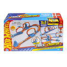 Hot Wheels tracks and connectors with three loops, including a car